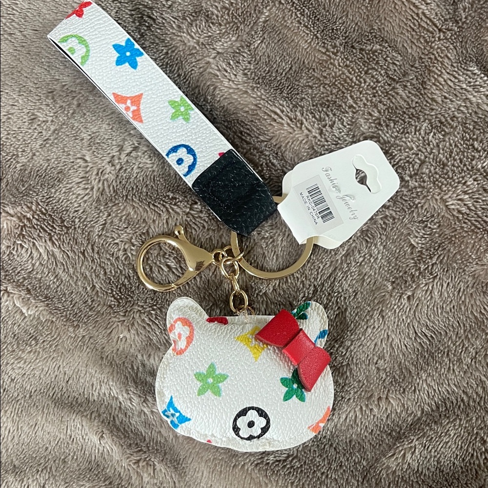 Hello Kitty multicolor luxury keychain purse Bag Charm with Red Bow nwt